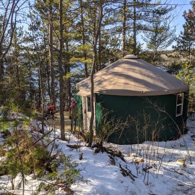 Green Yurt In Snow Backside